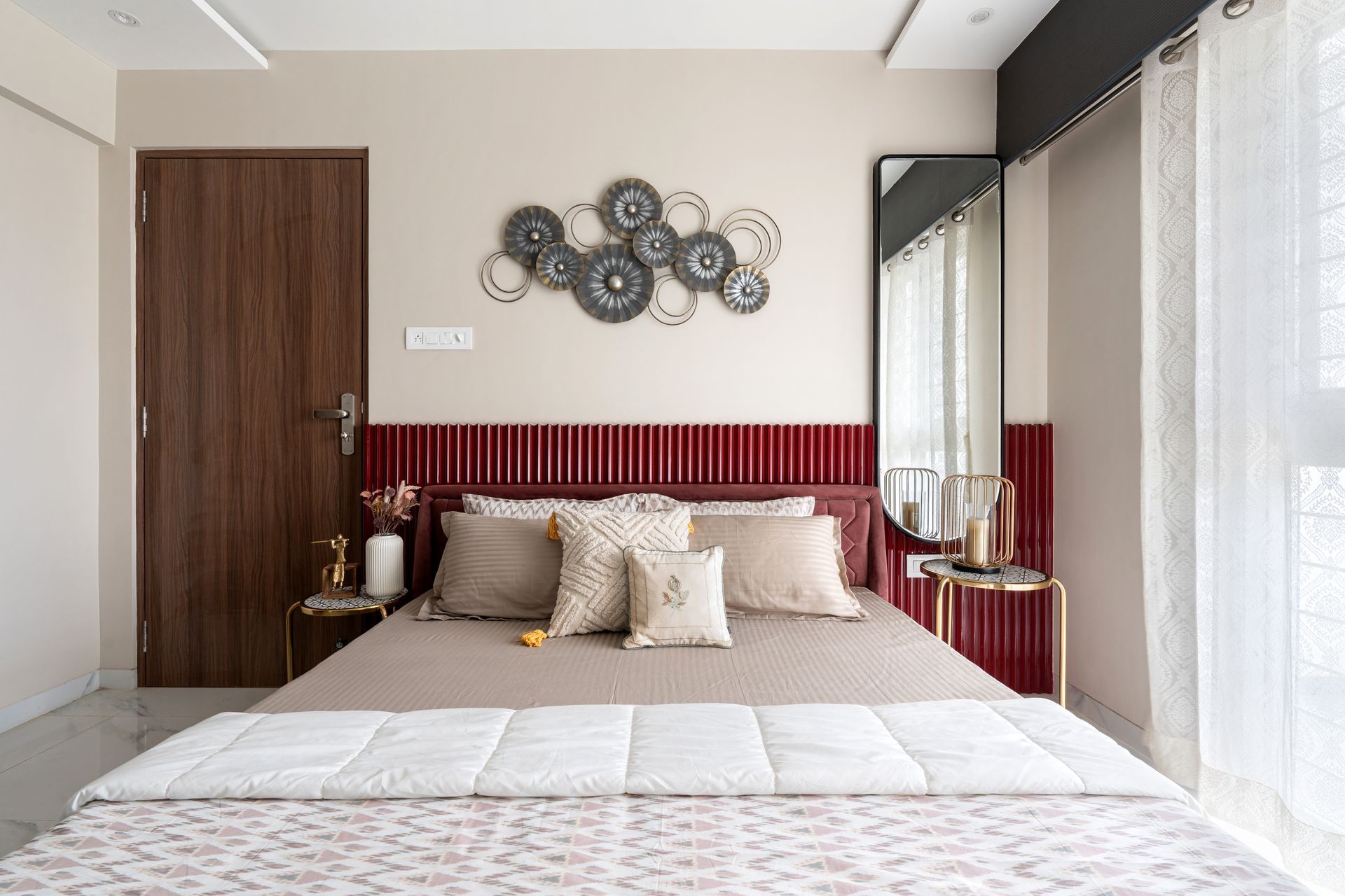 Master bedroom with burgundy headboard